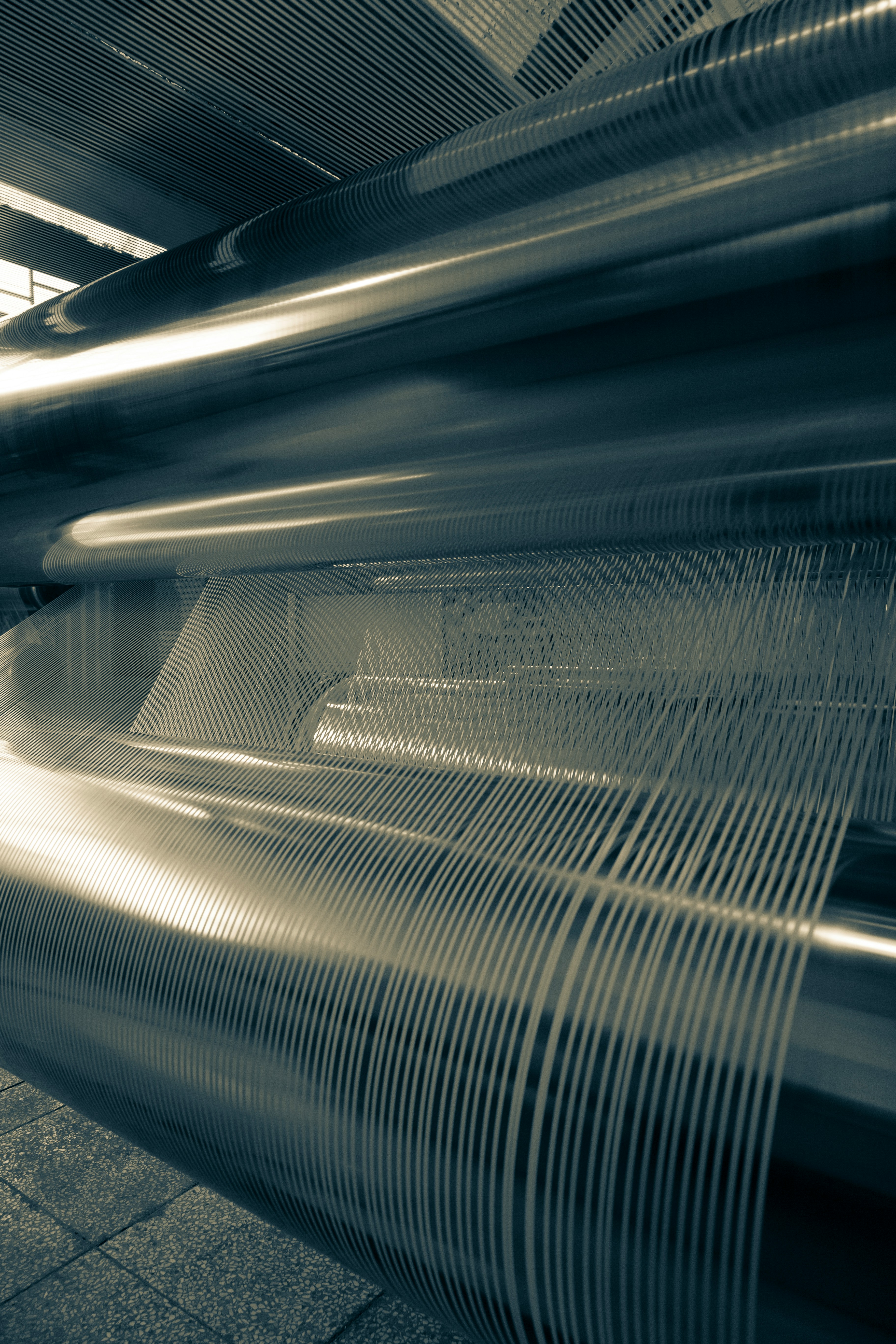 a long exposure photo of a conveyor belt