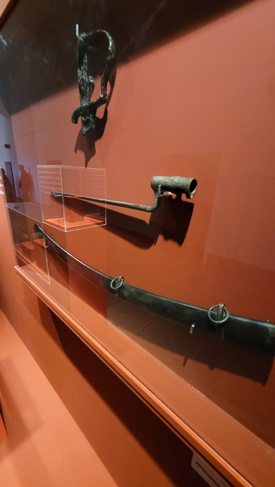 Interior of a cafe or workspace with several people at tables