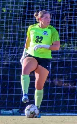man in black hoodie standing