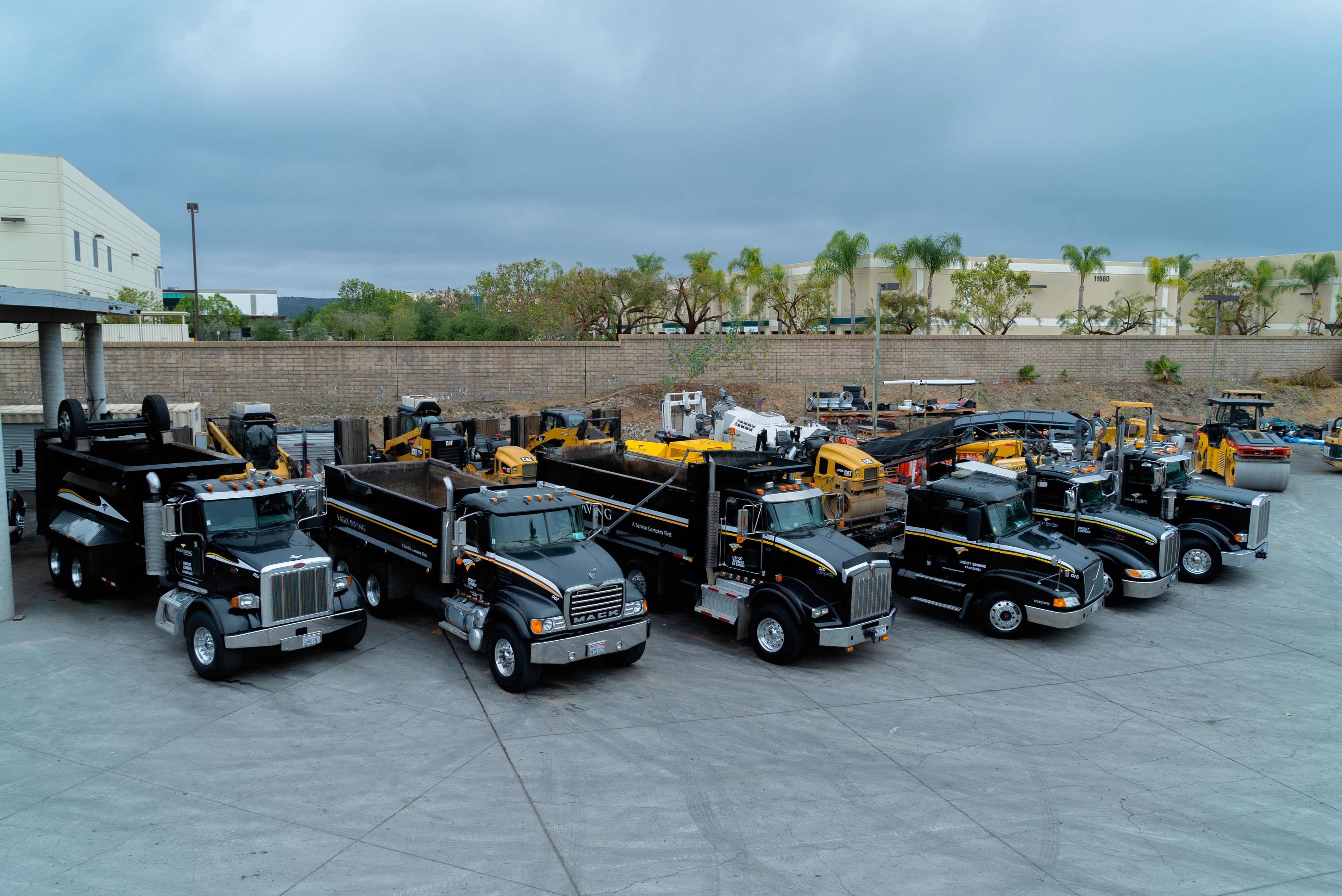 Present day asphalt paving fleet lineup