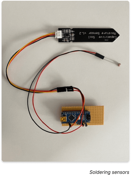 Moisture and light sensor soldered to micro arduino