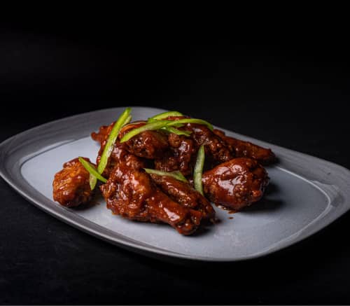 Ailes de poulet en sauce