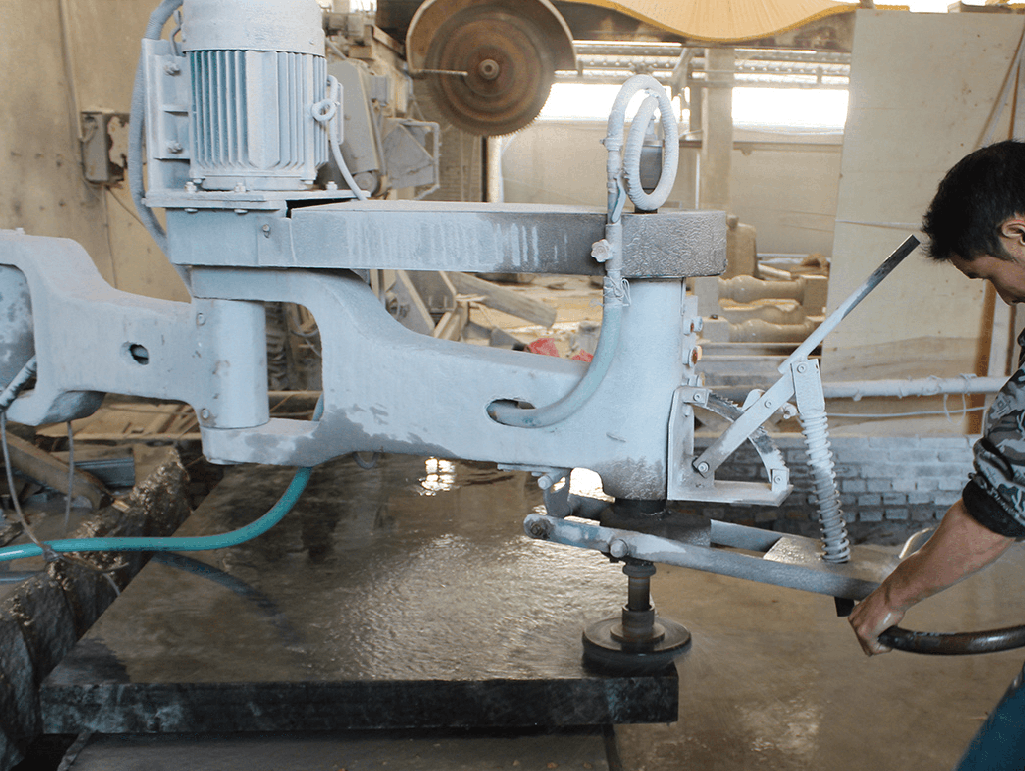 The Manual Polishing Machine in operation, demonstrating its efficiency and precision in polishing granite slabs to a high sheen.