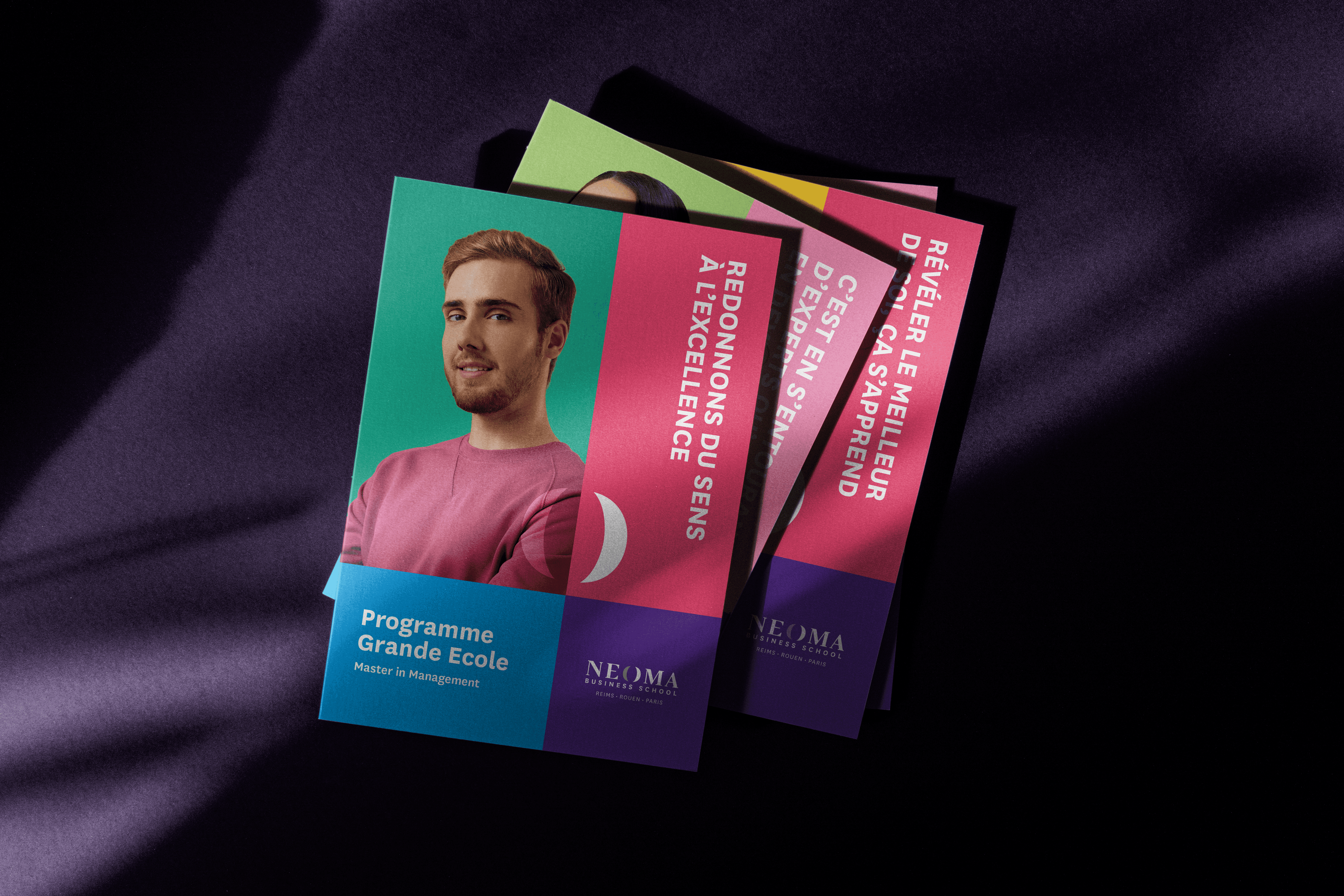 Streetside billboard with flyposters of the Batch.Works brand and illustrations