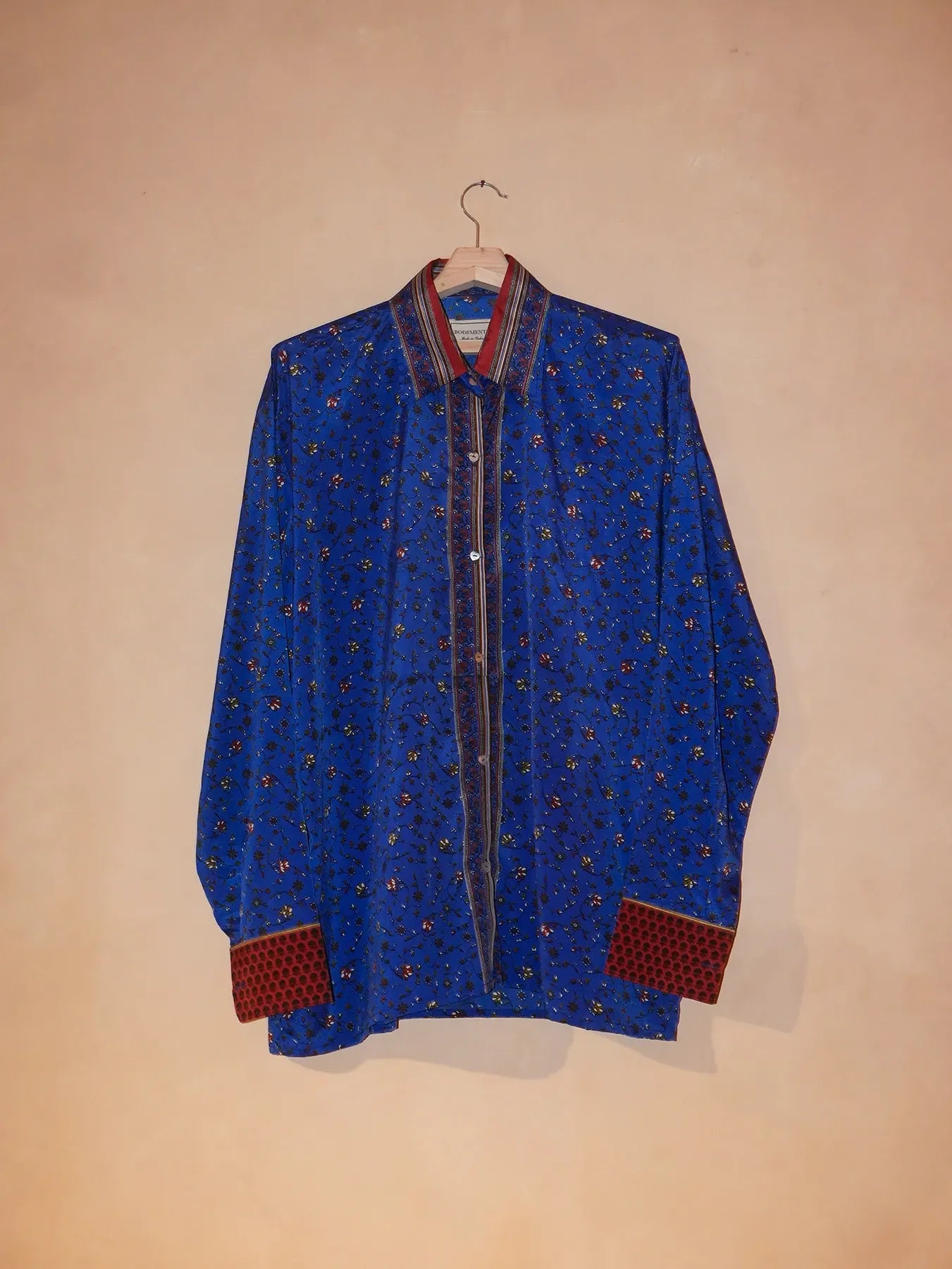 LAVYA III is a one-of-a-kind full-sleeve shirt, crafted from vintage fabric in a bold multicolour butterfly print.