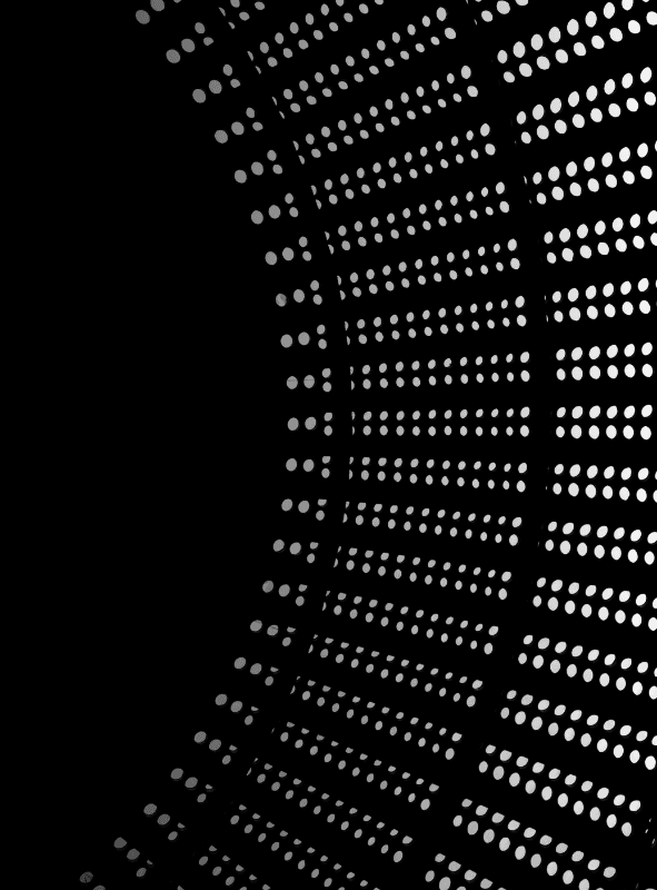 Warm wood kitchen with open shelves, spice jars, countertop decor, and a bowl of fruit.