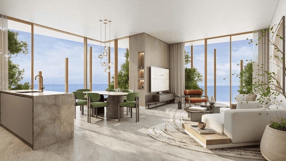 Elegant living room and dining area of a luxury condo, showcasing stylish furniture and sophisticated design elements.