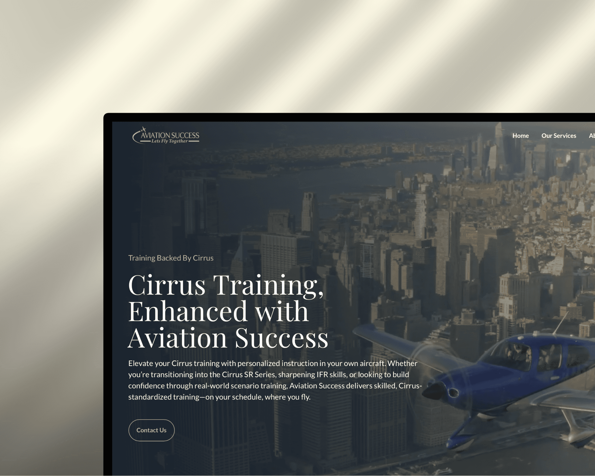 Laptop displaying aviation training website, showcasing Cirrus training with personalized instruction for pilots.