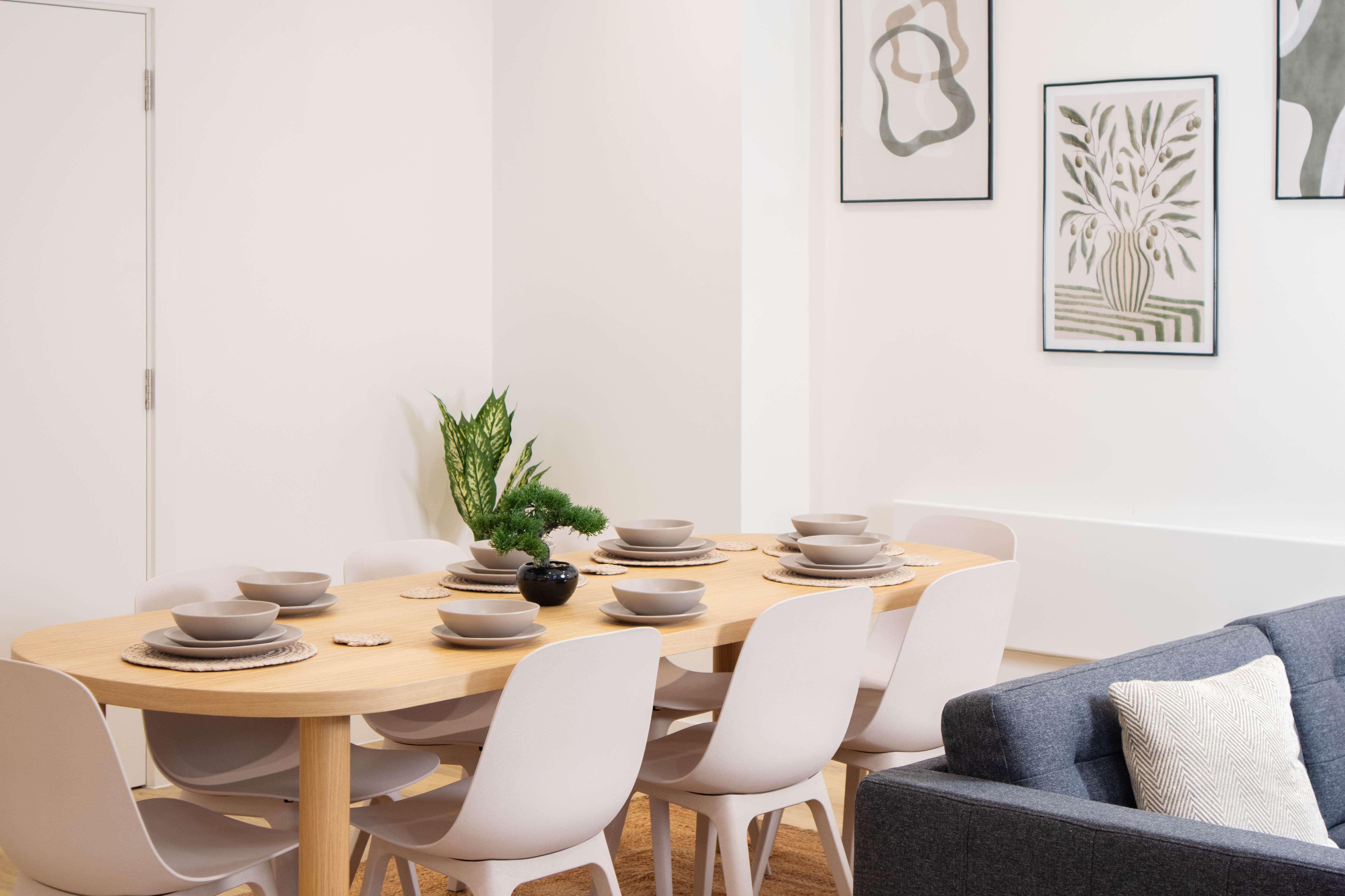 Modern minimalist dining area with chairs and dining set