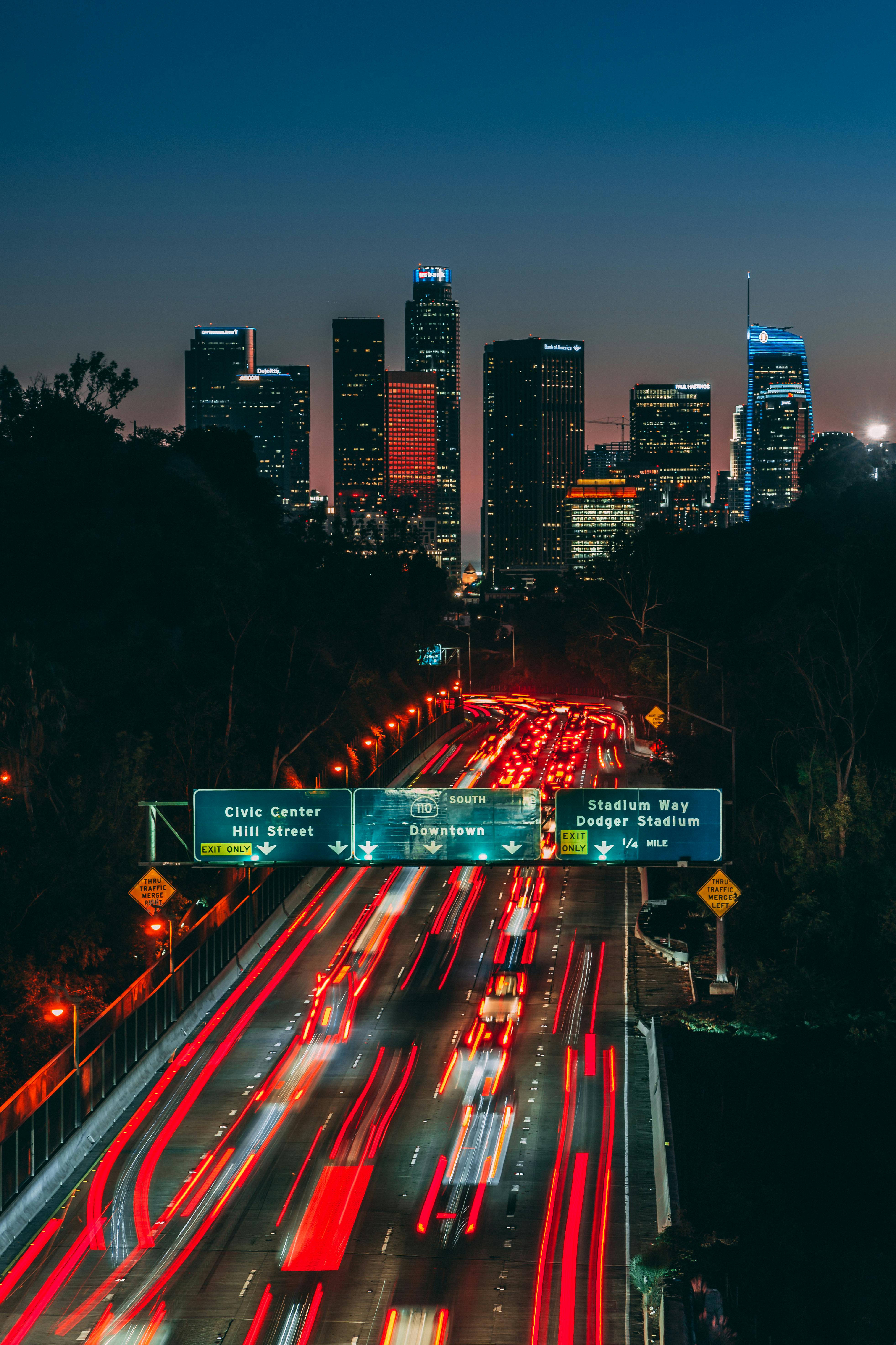 Vibrant Los Angeles skyline at dusk, promoting Barber.CLP as a luxury barber destination in West Hollywood.