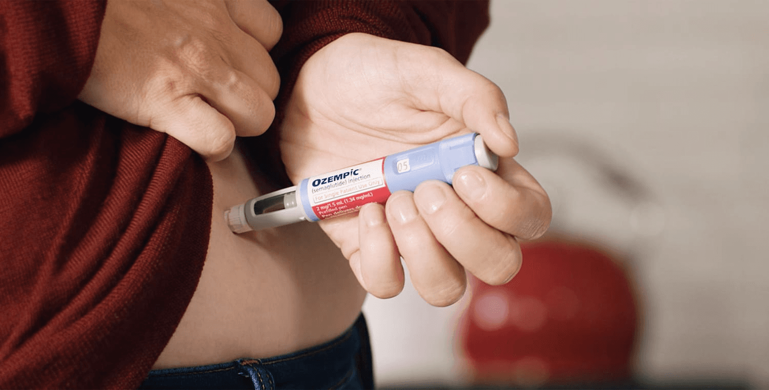  Person injecting Ozempic into their abdomen - Semaglutide Visceral Fat