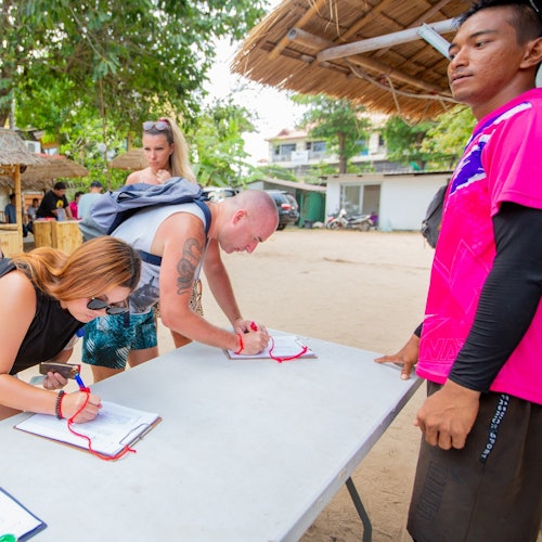 Check-in and sign for an insurance.