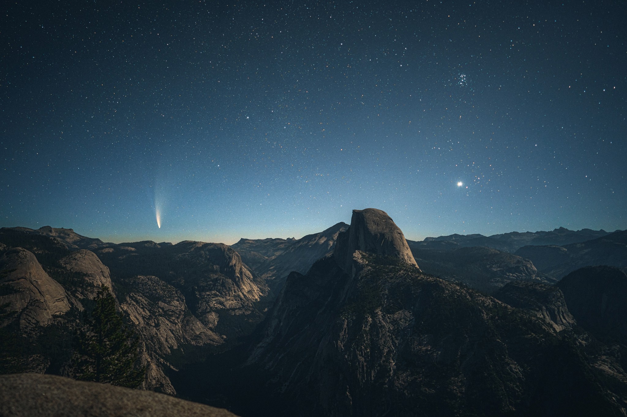 The half dome rock formation at Yosemite on a starry night