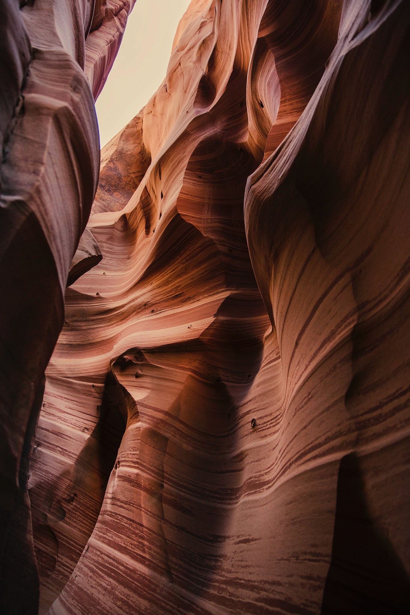 Canyon rock formation with light flowing in from the top