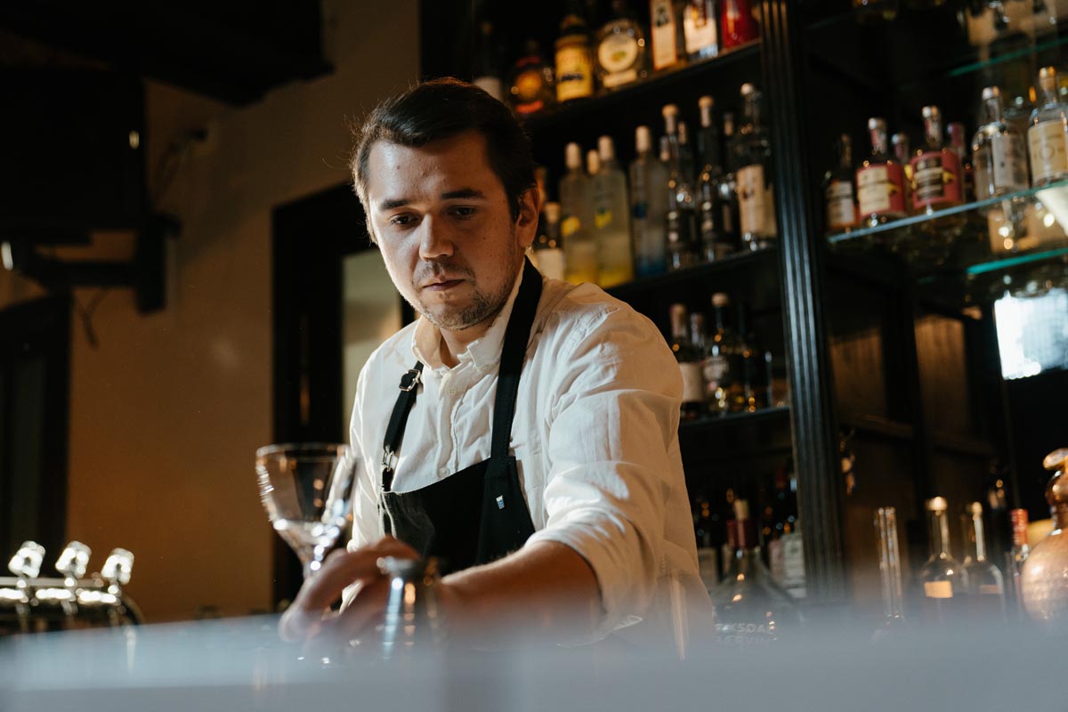 Bartender serving cocktail