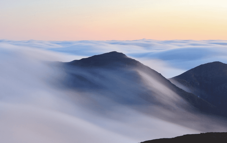 Mountains covered by clouds