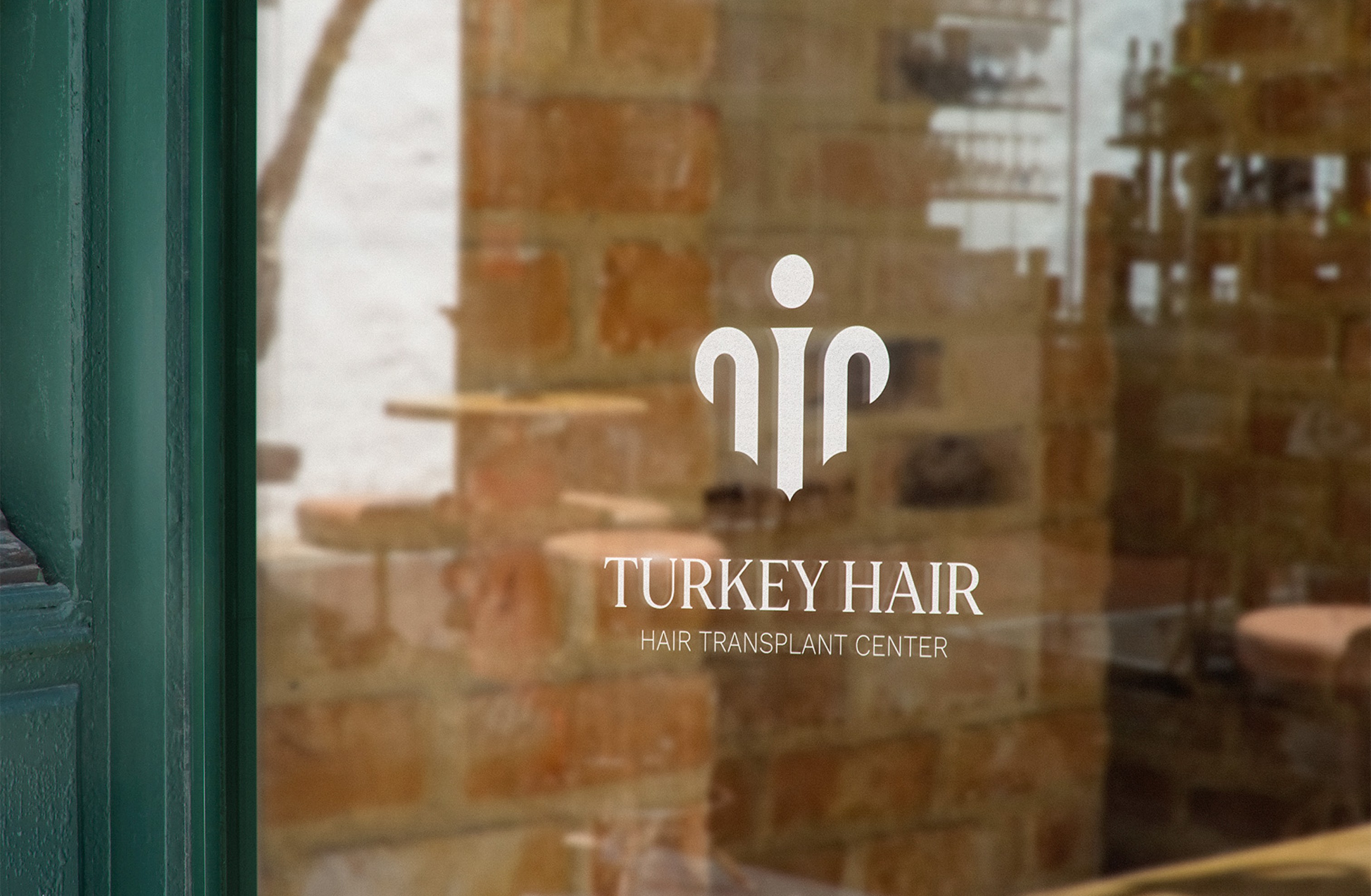 turkey hair logo on a glass pane