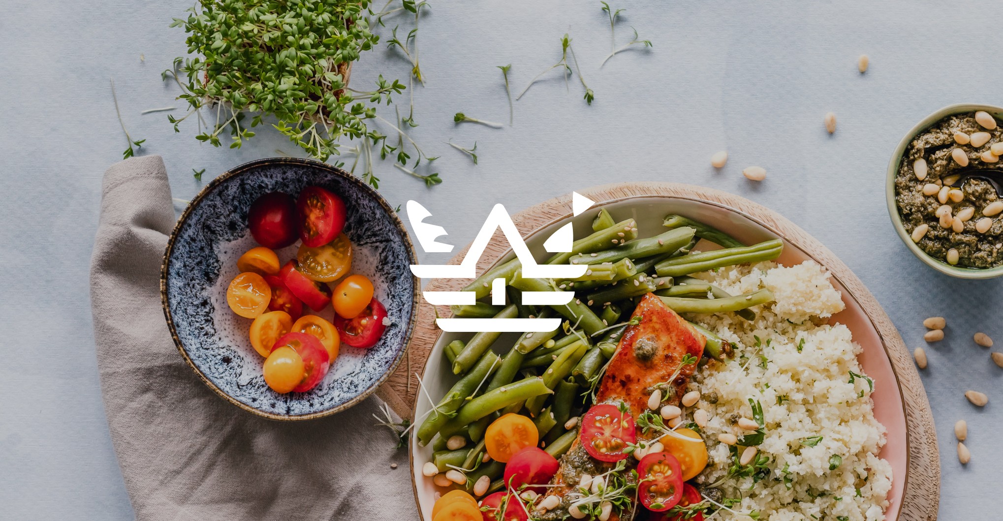 Dinner spread with salmon, rice, and veggies