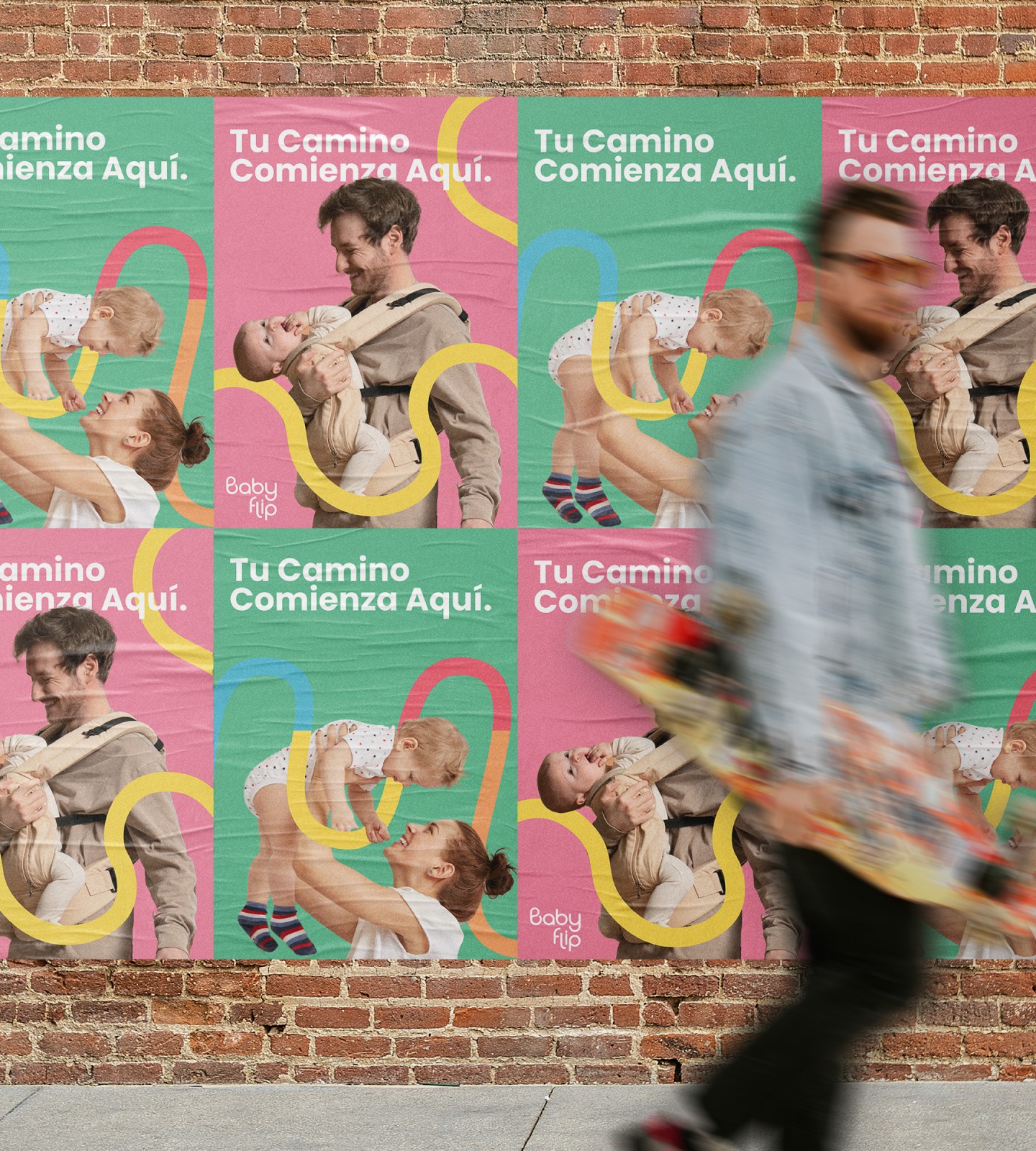 a man walking past posters of baby flip