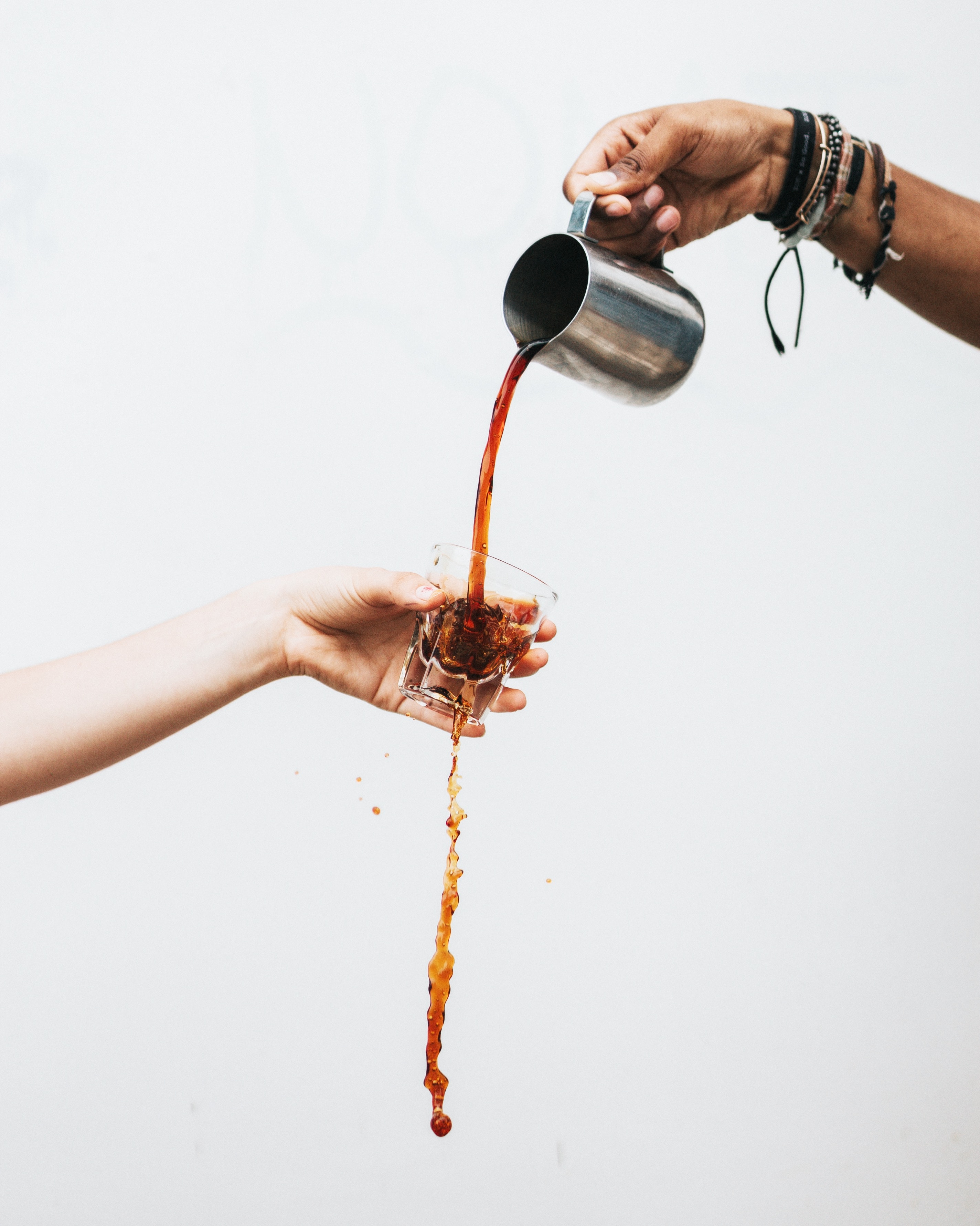 Image of coffee being poured into a glass
