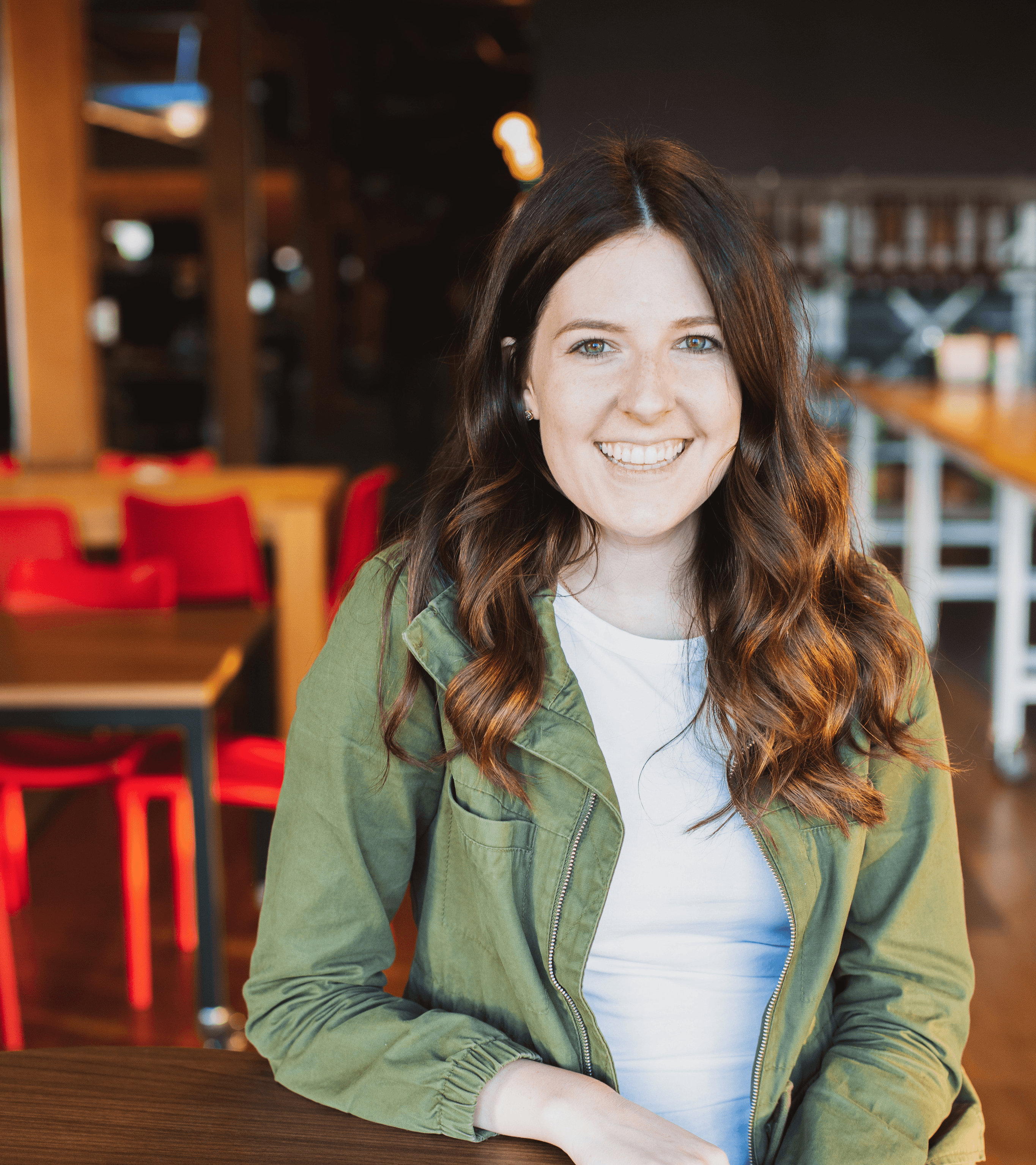 Designer Amy sitting at a table