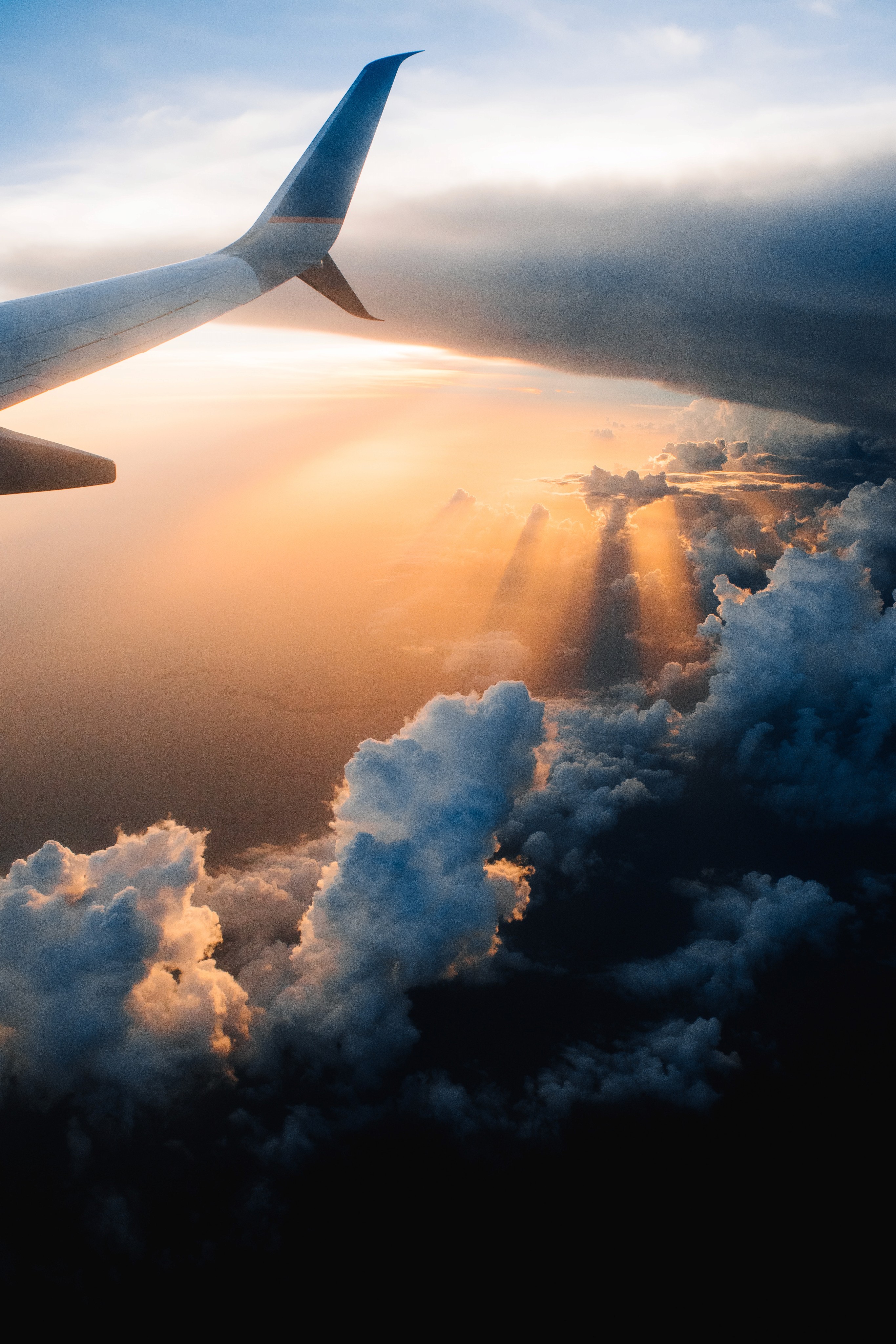 cloudy sky from an airplane seat