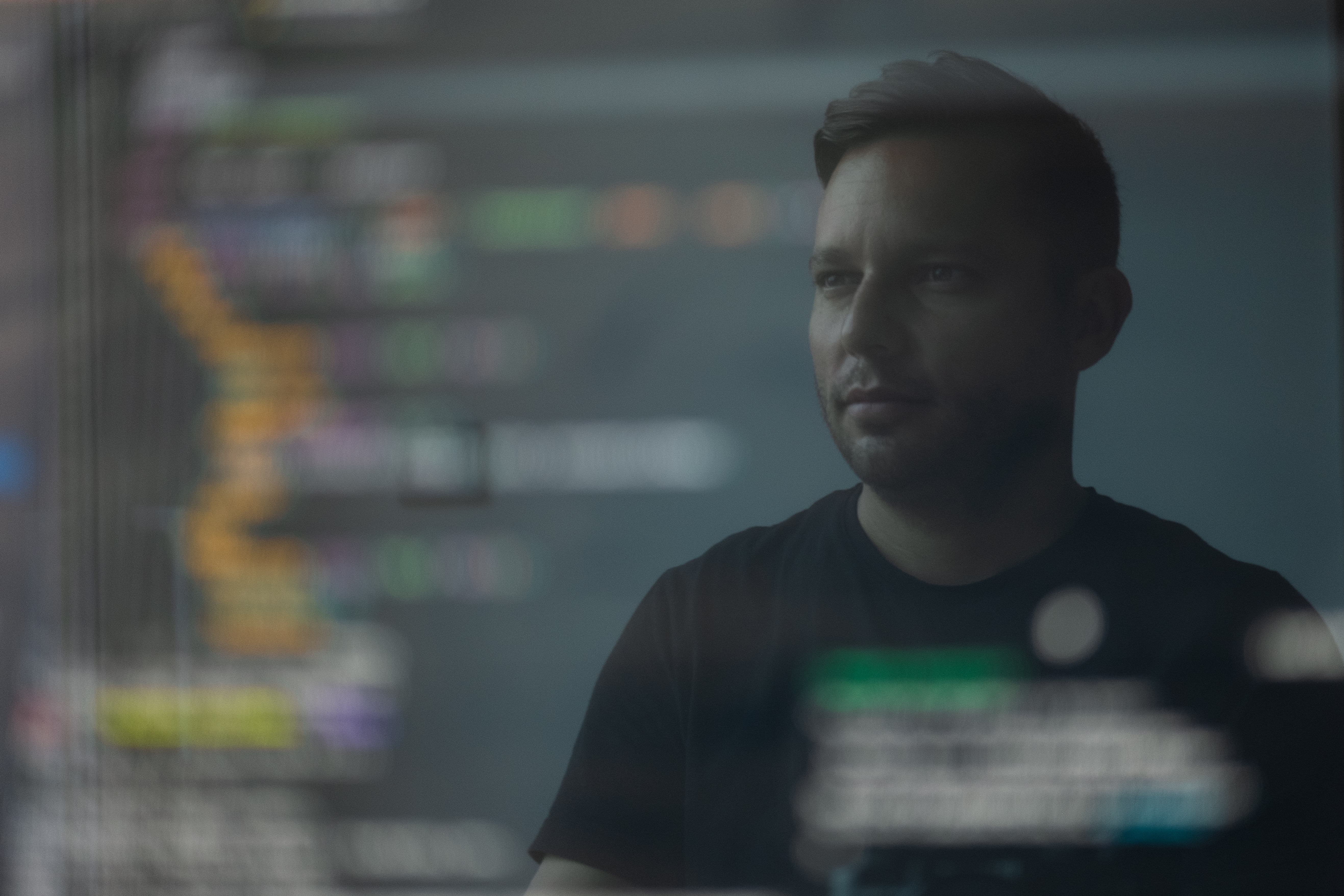 A man looking at code.